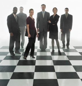 Businesspeople on Chess Board
